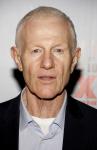 Raymond J Barry